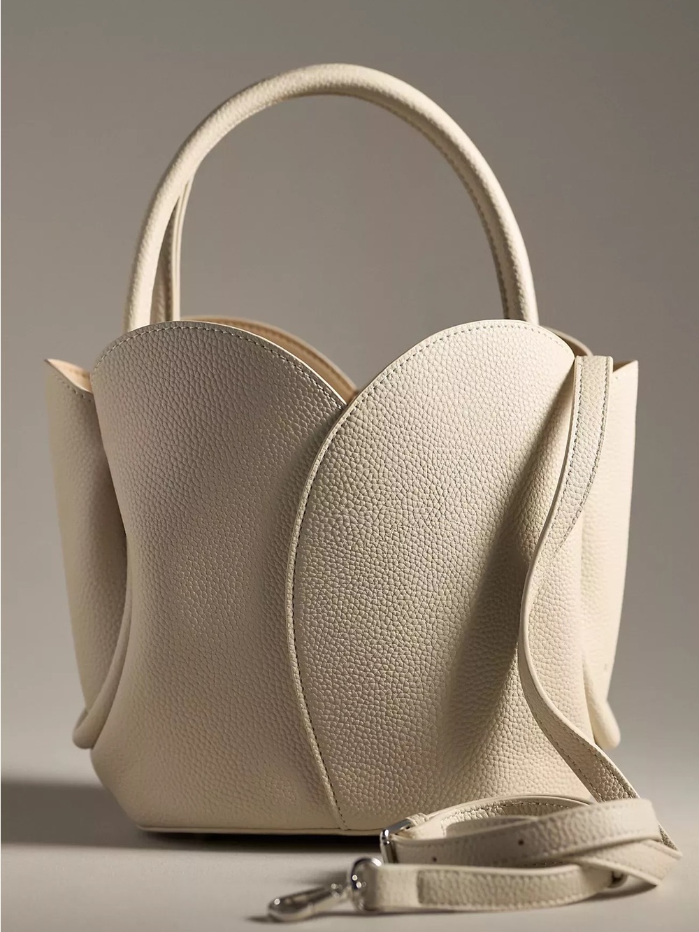 Melie Bianco tulip bone top handle bag